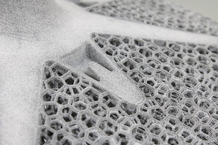 combination of lattice and solid structure in one part colored grey