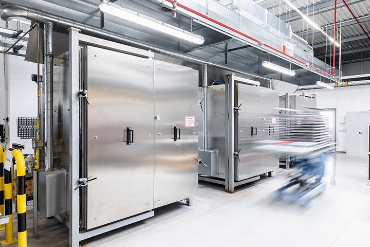 two industrial ovens closed for powder injection molding process